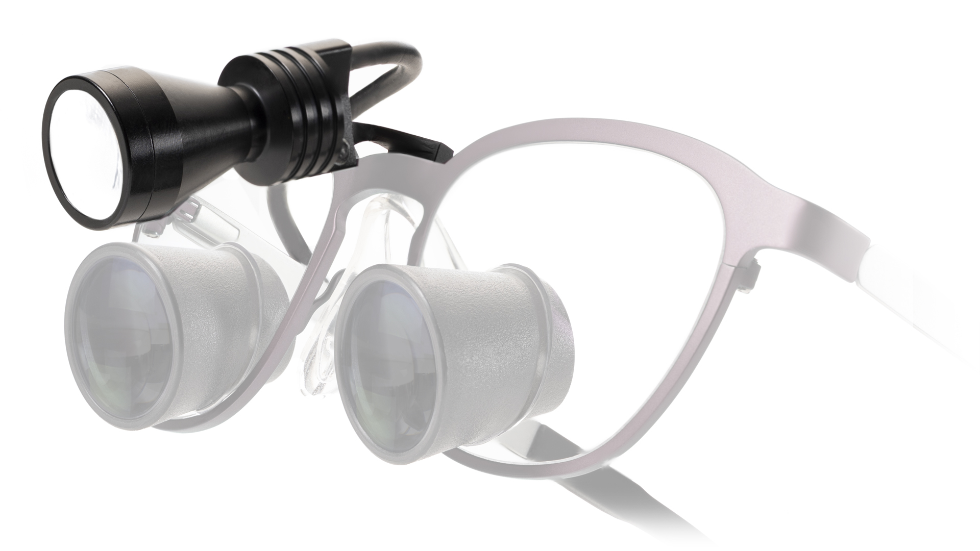 luces de lupa Essential Alpha montadas en lupas odontológicas